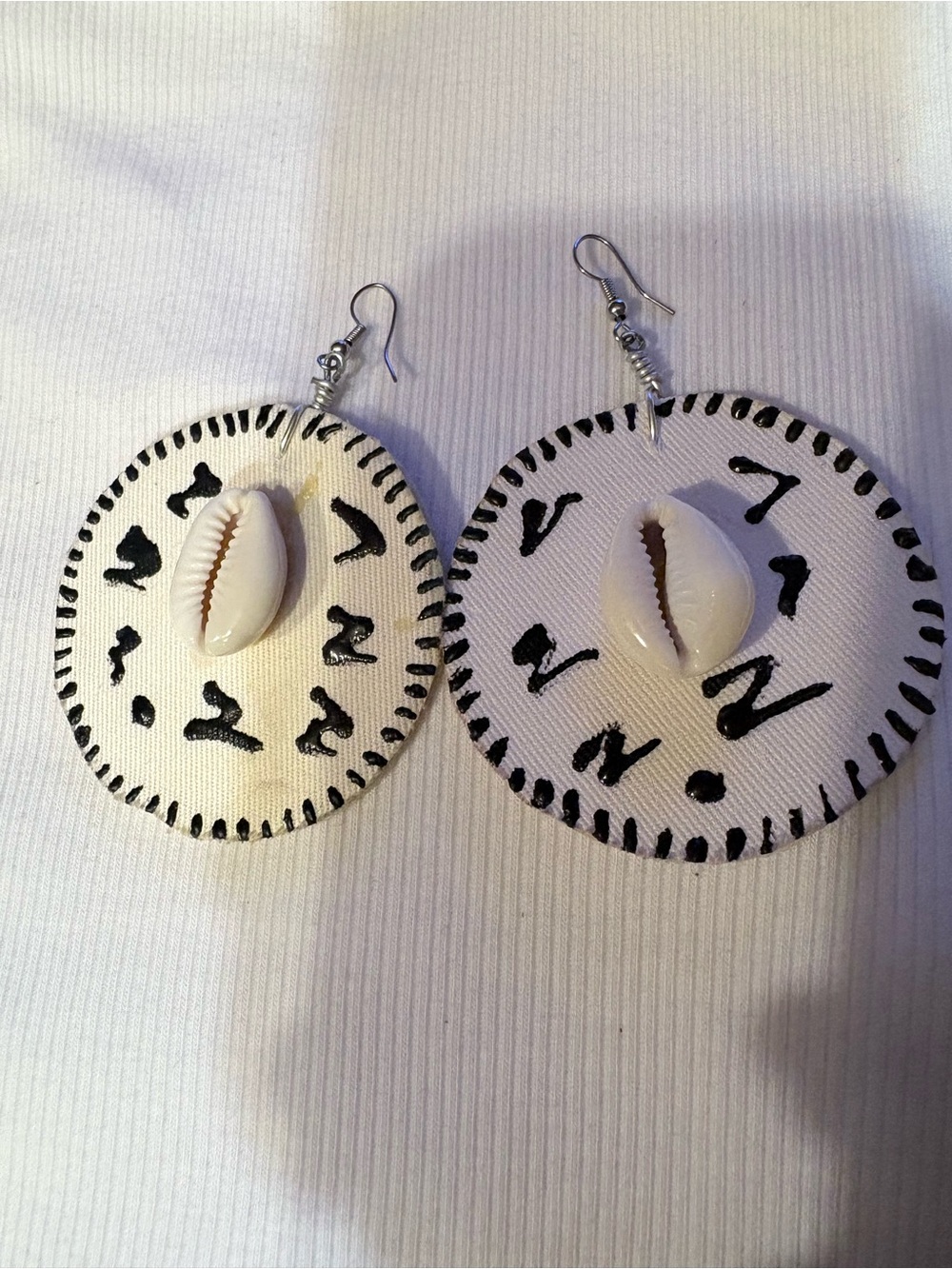 Handmade White Cowrie Shell Drop Earrings with Black Accents.
